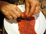 Meat bundles with tomato sauce