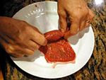 Meat bundles with tomato sauce